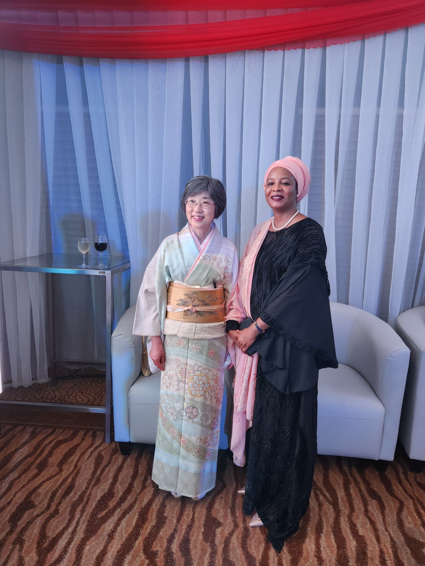 Saratu Umar with an international guest at a diplomatic reception